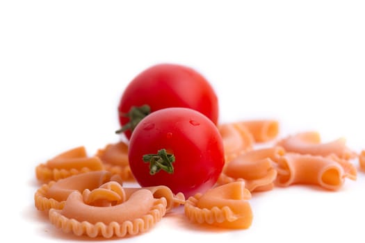 Raw pasta with tomatoes