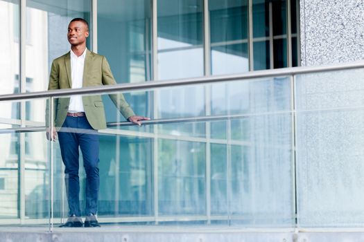 young successful african business man outdoor in summer self confident