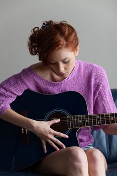 redhead with a guitar