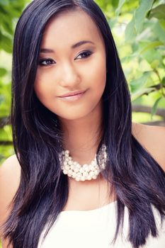 attractive young asian woman beauty portrait outdoor summer green background
