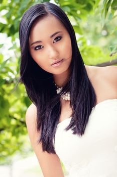 attractive young asian woman beauty portrait outdoor summer green background