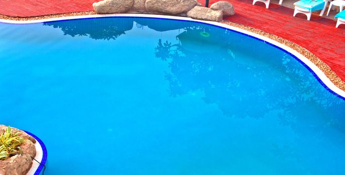 Luxury Resort Swimming Pool
high angle on curved edge of a luxury resort swimming pool