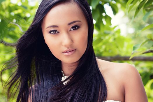 attractive young asian woman beauty portrait outdoor summer green background