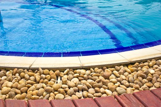 Luxury Resort Swimming Pool
low angle on curved edge of a luxury resort swimming pool
