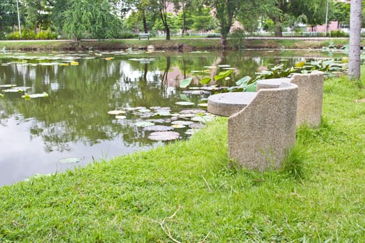 stone bench at Vachirabenjatas Park (Rot Fai Park) in Thailand - nice background