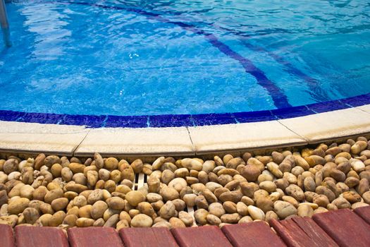 Luxury Resort Swimming Pool
low angle on curved edge of a luxury resort swimming pool