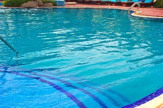 Luxury Resort Swimming Pool
low angle on curved edge of a luxury resort swimming pool