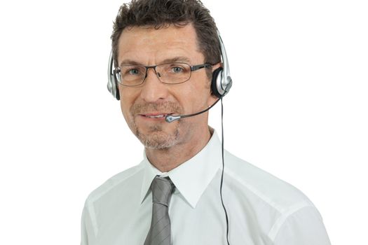 smiling mature male operator businessman with headset call senter helpdesk