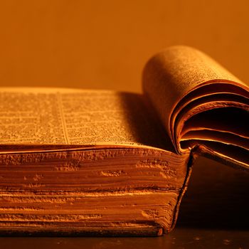 Close up of history old book in library Close up of history old book in library