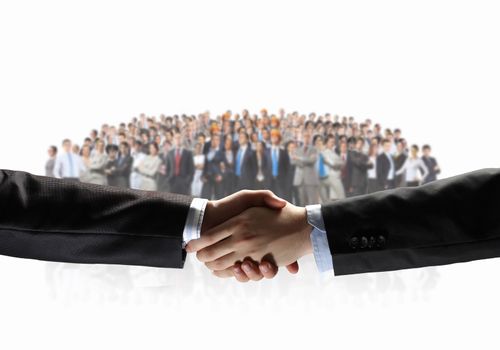 Handshake of business people with people at background