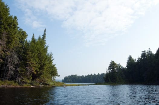 Sunrise on the forest lake in Algonquin Park. Lost Joe Lake