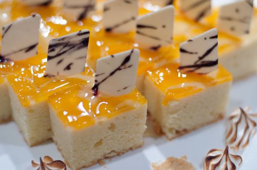 a piece of orage jam cake