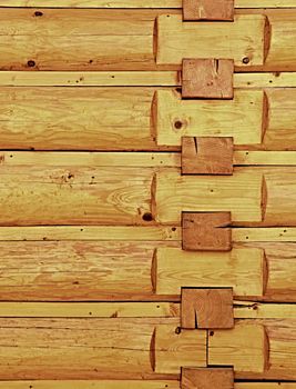 background or texture of a wooden log cabin wall