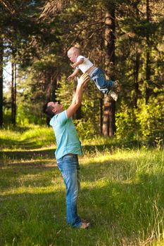 Joyful father and his son