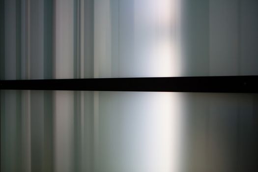 Abstract photo of vertical lines and blurs.