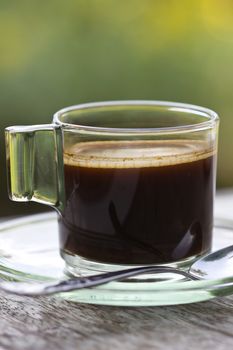 Black coffee in a glass on the table