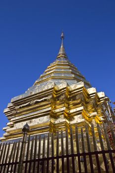 Golden sculpture and blue sky at Wat Phra That Doi Suthep