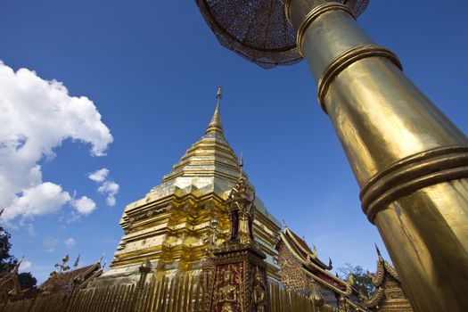 Golden sculpture and blue sky at Wat Phra That Doi Suthep