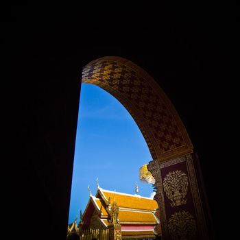 Golden sculpture and blue sky at Wat Phra That Doi Suthep