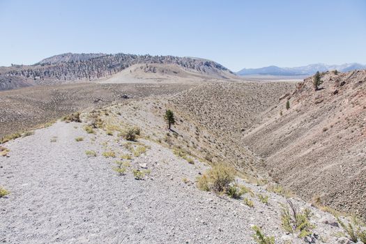 Panum Crater is a volcanic cone that is part of the Mono-Inyo Craters, a chain of recent volcanic cones south of Mono Lake and east of the Sierra Nevada, in California, USA.