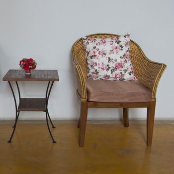 Wicker chairs are placed in the living room.