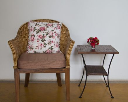 Wicker chairs are placed in the living room.