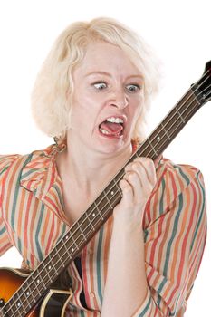 Angry guitar student yelling at her instrument