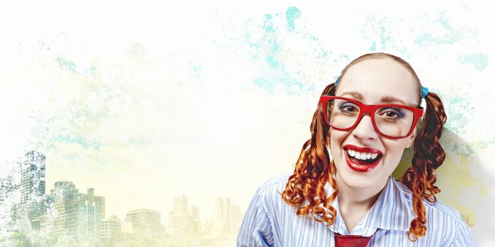 Funny looking red-hair woman with glasses staring at camera