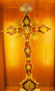 Ornate Golden Cross Seville Cathedral, Cathedral of Saint Mary of the See, Seville, Andalusia Spain.  Built in the 1500s.