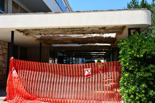 devastated ceiling roof, broken concrete construction 