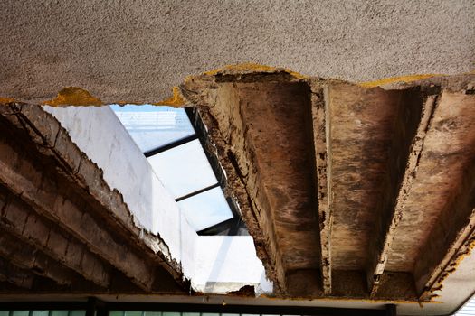 devastated ceiling roof, broken concrete construction 