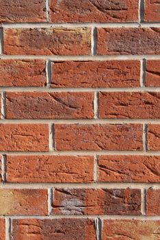 Abstract textured background of red brick wall.