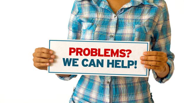 A woman holding a Problems, we can help sign.