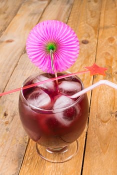 Fruity cherry cocktail on plenty of ice