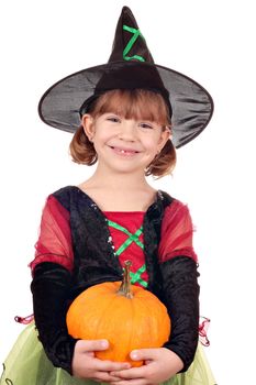 happy little girl witch with pumpkin halloween