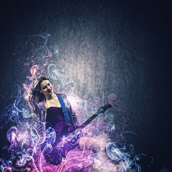 Rock passionate girl with black wings and lights
