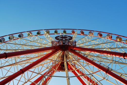 Ferris wheel in blue sky
