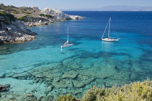 The wonderful colors of the sea in cala spinosa, a bay of Capo Testa, in Gallura