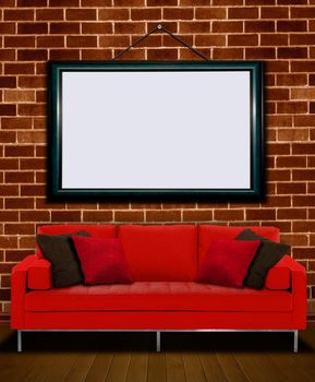 Red sofa with picture frame over brick wall
