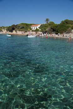 The wonderful colors of the sea in Santa Maria beach, an island of the La Maddalena archipelago in Sardinia, Italy