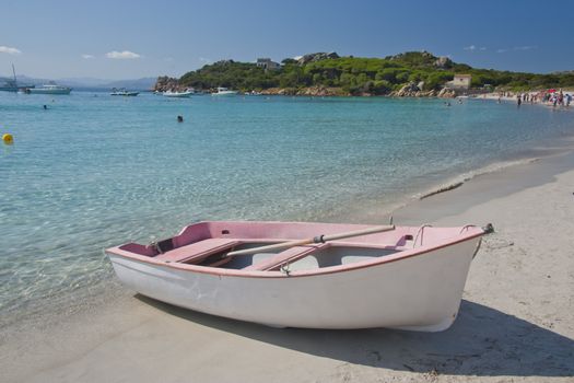 Boat on a  beach of Santa Maria, an island of the La Maddalena archipelago in Sardinia, Italy