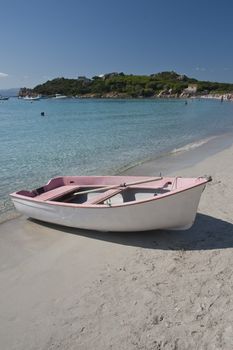 Boat on a  beach of Santa Maria, an island of the La Maddalena archipelago in Sardinia, Italy