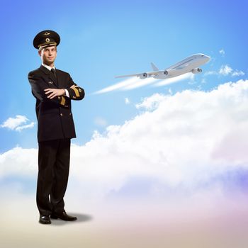 pilot is in the form of arms folded, against the sky, the clouds and the plane