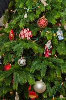 Christmas ornaments are decorations (usually made of glass, metal, wood or ceramics) that are used to festoon a Christmas tree.