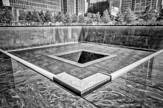 NEW YORK - MAY 27: NYC's 9/11 Memorial at World Trade Center Ground Zero seen on May 27, 2013. The memorial is located at the World Trade Center site, on the former location of the Twin Towers