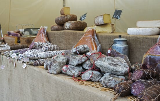 meat and cheese on belgium market in the place bouillon