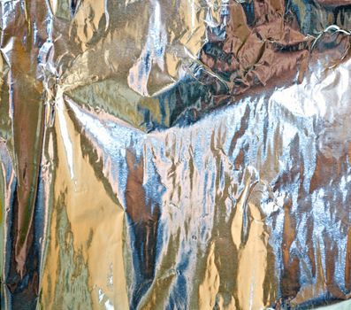 Background. Aluminum foil as a background unusual