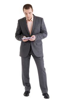 man in a suit counts money on white background