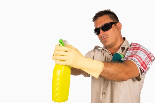 Latin male cleaning his house