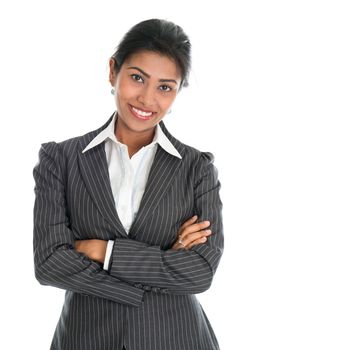 Portrait of young African American businesswoman in business suit, isolated over white background. Mixed race Asian Indian and African American model.